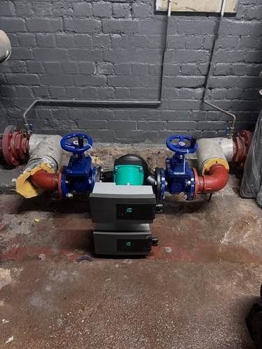 Commercial plant room pipework with pressure gauges