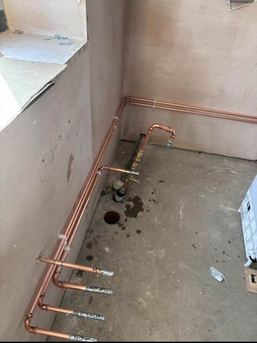 First-fix copper pipework array fitted to a floor