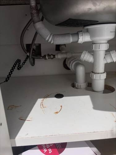 Under-sink pipework with waste trap fitted